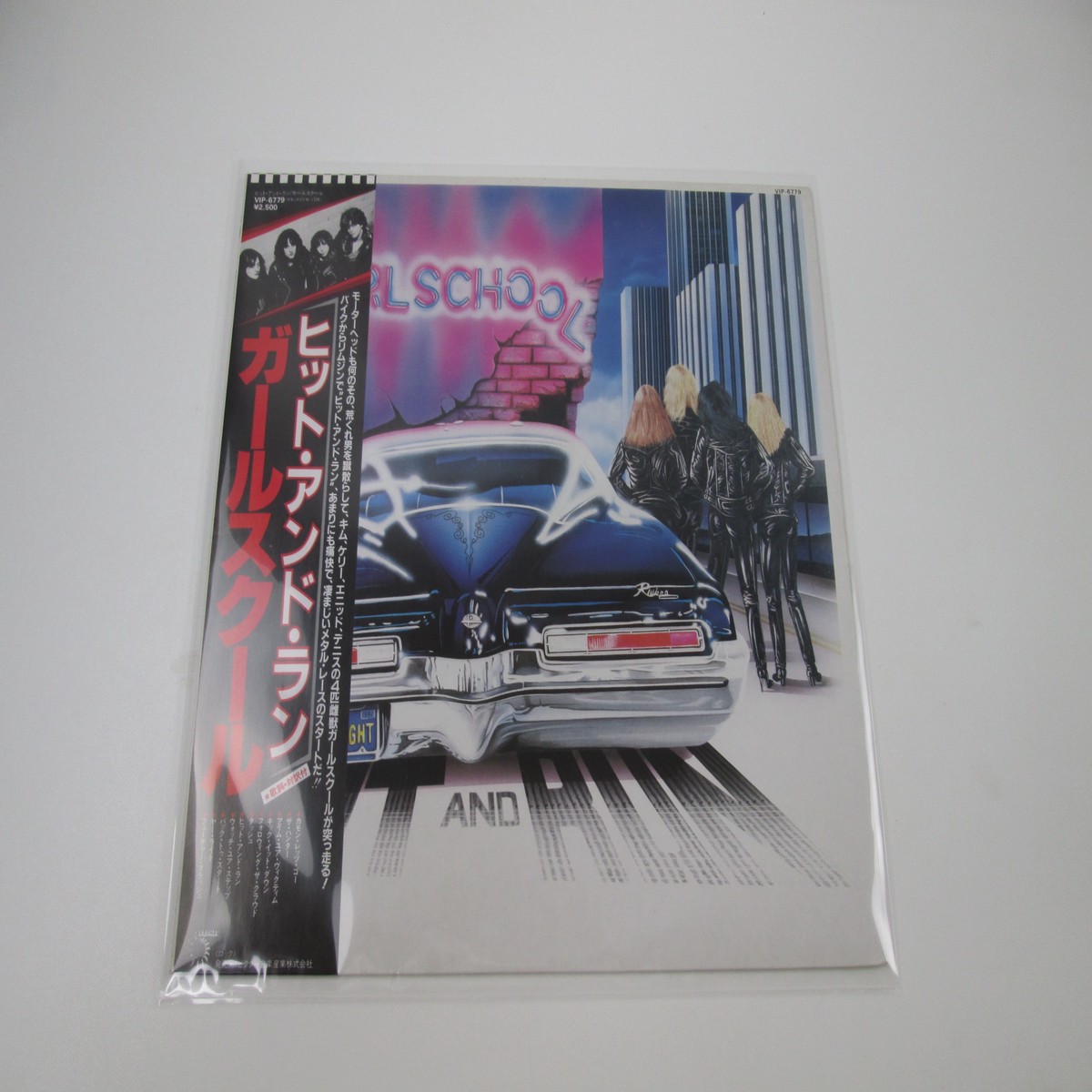 GIRLSCHOOL HIT AND RUN BRONZE VIP-6779 with OBI Japan VINYL LP